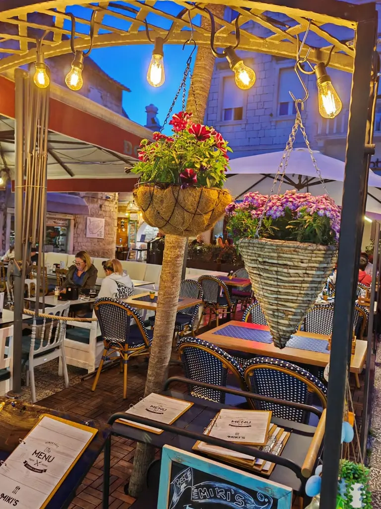 Miki's Food & Bar terrace lights in Trogir old town
