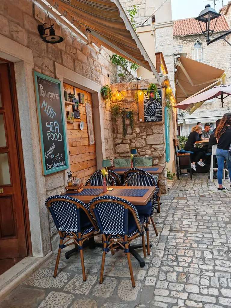 Old town lane seating at Miki's Food & Bar in Trogir