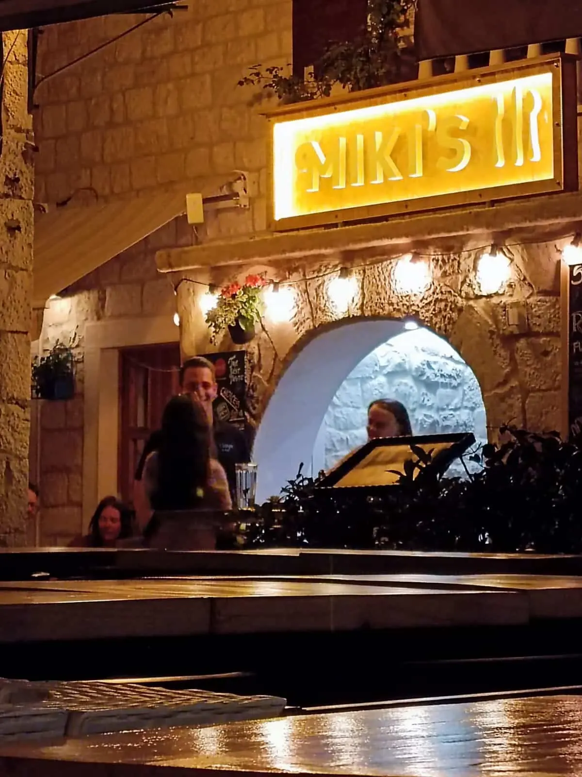 Restaurant exterior at night at Miki's Food & Bar Trogir